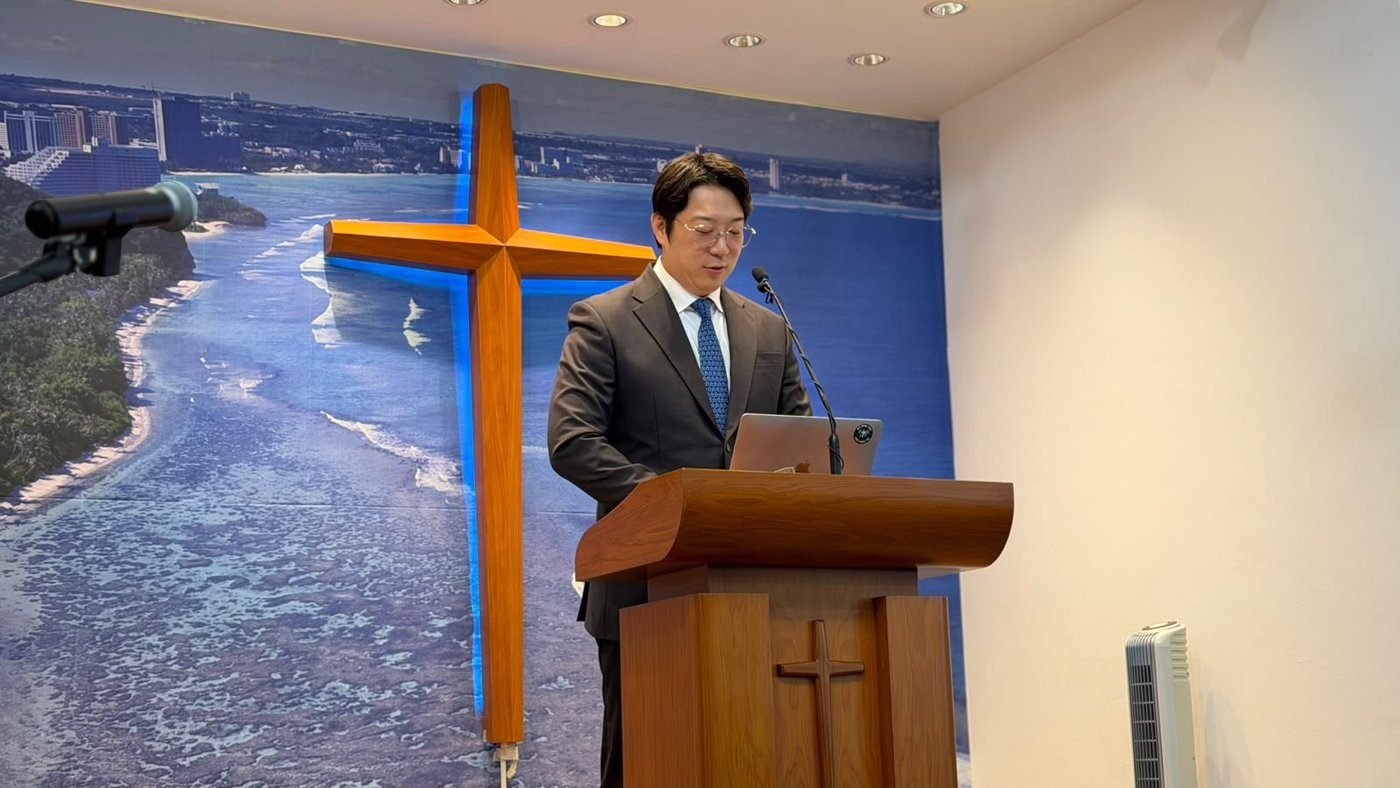 Eric Ji preaching from the pulpit at Guam Evergreen Presbyterian Church